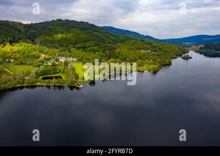 Tigh Mor Trossachs, Loch Lomond and Trossachs National Park, Scotland, UK. 29th May, 2021. PICTURED: Drone photography view of Tigh Mor Trossachs seen from the air on the banks of Loch Achray. Pic Credit: Colin Fisher/Alamy Live News Stock Photo