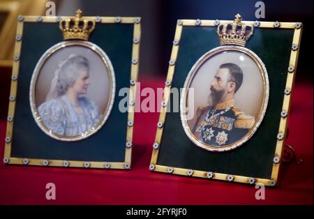 Bucharest, Romania - May 10, 2021: Portraits of King Carol I of Romania and Queen Elisabeth are exhibited at the Royal Palace in Bucharest where the N Stock Photo