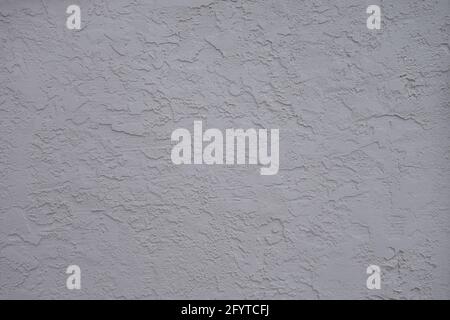 Textured stucco grey wall surface background Stock Photo