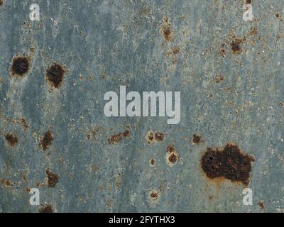 Galvanized steel surface with rust spots using as background Stock Photo