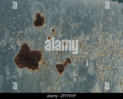 Galvanized steel surface with rust spots using as background Stock Photo