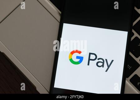 Krakow, Poland - September 30, 2020: GPay application sign on the screen smartphone. Google Pay is a famous digital wallet platform Stock Photo