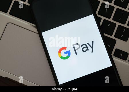 Krakow, Poland - September 30, 2020: GPay application sign on the screen smartphone. Google Pay is a famous digital wallet platform Stock Photo