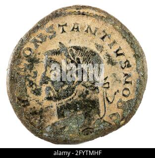 An obverse ancient Roman copper coin of Emperor Constantius isolated on white background Stock Photo