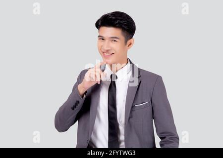 Portrait young asian business man in suit with smart thinking idea isolated on white background, businessman standing and planning for success, handso Stock Photo