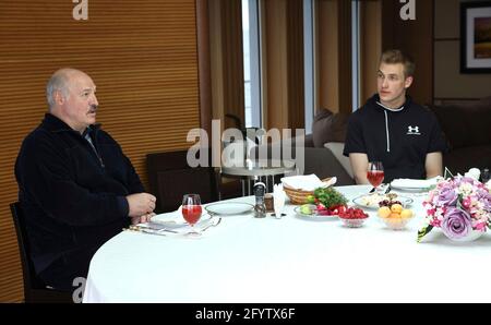 Sochi, Russia. 29th May, 2021. Belarus President Alexander Lukashenko and his son Nikolai Lukashenko, center, during a breakfast hosted by Russian President Vladimir Putin, onboard a yacht on the Black Sea May 29, 2021 in Sochi, Russia. Credit: Planetpix/Alamy Live News Stock Photo