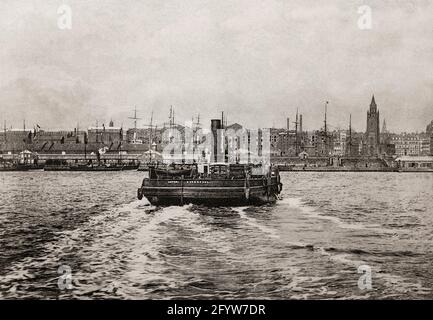 A late 19th century view of a steam ferry crossing the River Mersey from Birkenhead to Liverpool.  Ferries have been used on this route since at least the 12th century, and by the 1840s, Birkenhead was developing into a busy new town. The railway to Chester had opened, the town was growing quickly, and docks were under construction. In 1847, the first floating landing stage, which rose and fell with the tide so that boats could dock at any time, was opened at Liverpool.