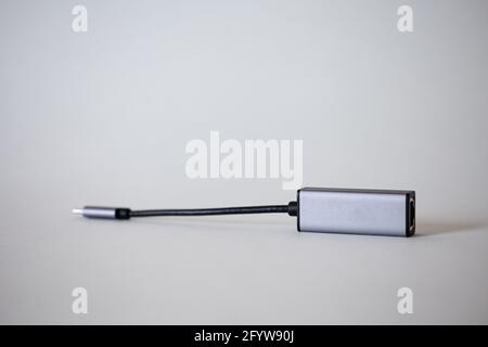 Ethernet laptop adapter - type C on a white background. Stock Photo