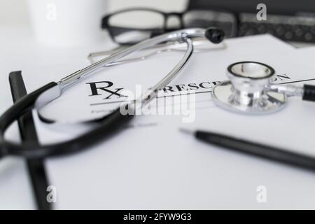 Stethoscope on Rx prescription for medical concept. Stock Photo