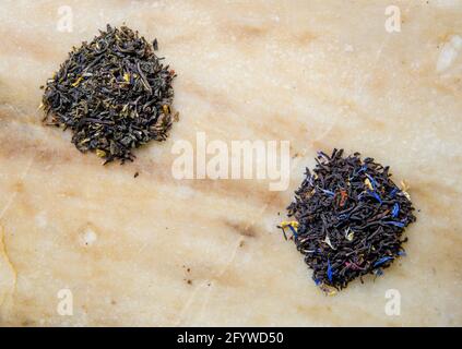 two kinds of Chinese leaf tea in the background. Stock Photo