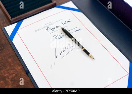 The signatures of House speaker Nancy Pelosi, Senator Majority Leader Charles “Chuck” Schumer and President Joe Biden are seen on the “American Rescue Plan Act of 2021”  Thursday, March 11, 2021, in the Oval Office of the White House. (Official White House Photo by Lawrence Jackson) Stock Photo