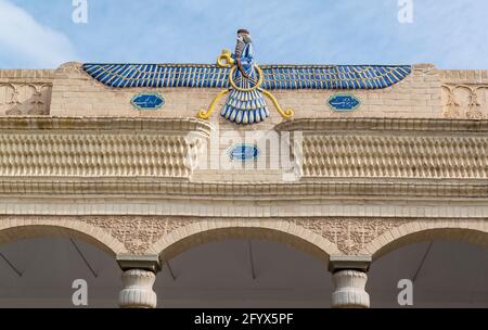 Faravahar symbol of Zoroastrianism, an Iranian religion prior to Islam, on a Fire Temple in Yazd, Yazd Province, Iran. Stock Photo