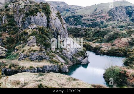 mountain with lake with rock formations Stock Photo