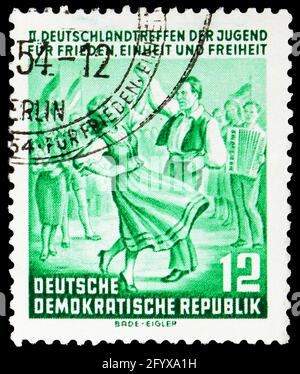 MOSCOW, RUSSIA - SEPTEMBER 27, 2019: Postage stamp printed in Germany, Democratic Republic, shows Dancing Couple, 2nd German Youth Meeting for Peace, Stock Photo
