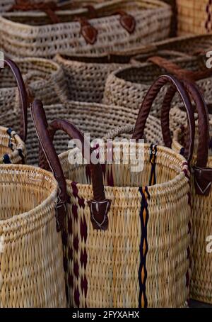 Handmade woven wicker basket display in the medina of the Moroccan town Essaouira, North Africa. Stock Photo