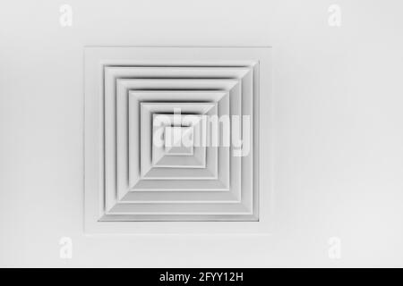 White square ventilation grill on the ceiling. Stock Photo