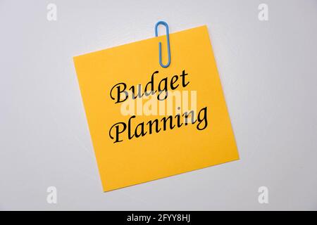 Budget planning words on a yellow sticky notes. Stock Photo