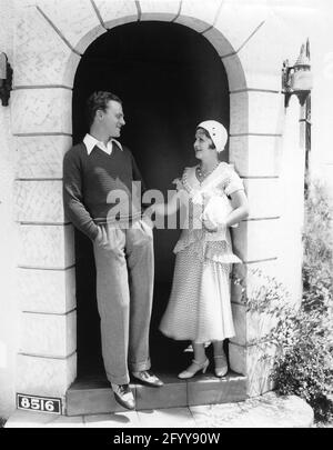 JAMES CAGNEY and his Wife BILLIE / FRANCES CAGNEY at the front door of their home July 1931 publicity for Warner Bros. Stock Photo