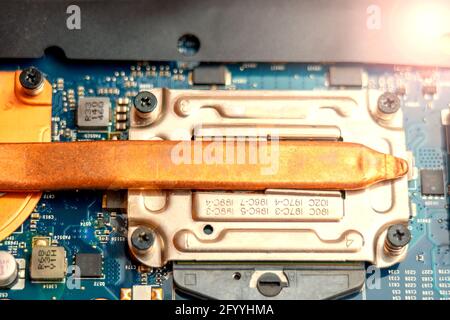 Copper tube of microprocessor cooling system on laptop motherboard Stock Photo