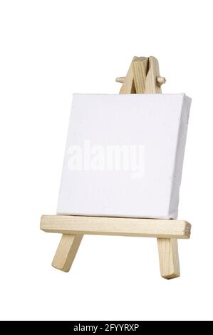 A small easel for painting pictures. Accessories for artist painters. Isolated background. Stock Photo