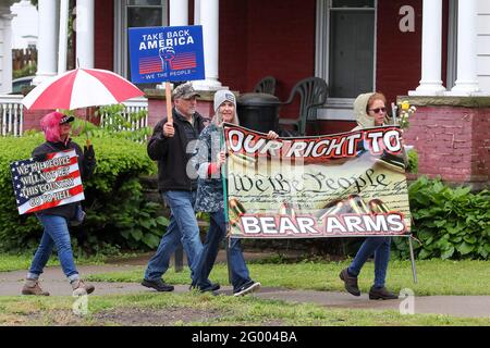 Bloomsburg, United States. 29th May, 2021. Members of We The People of Columbia County march during the rally.About 100 self-described patriots marched from Bloomsburg Town Park to Market Square for a pro-freedom rally during the Memorial Day weekend. (Photo by Paul Weaver/SOPA Images/Sipa USA) Credit: Sipa USA/Alamy Live News Stock Photo