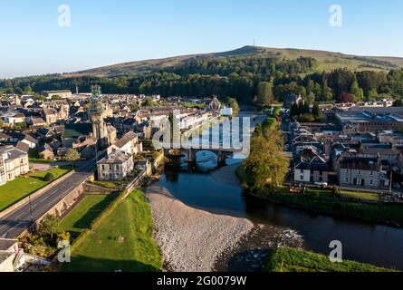 Aerial view of Langholm town centre situated at the junction of the River Esk and River Ews, Dumfries & Galloway, Scottish Borders, Scotland, UK. Stock Photo