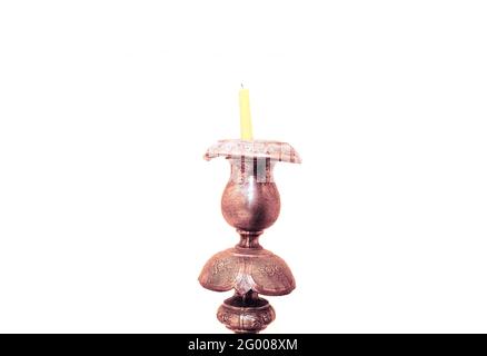 Candle on the Candlestick . Antique Candle Holder Stock Photo