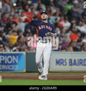 May 30, 2021: Astros first baseman Aledmys Díaz (16) makes a catch in foul  territory during MLB action between the San Diego Padres and the Houston  Astros at Minute Maid Park in