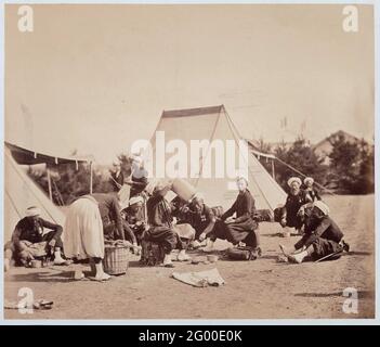 Zouaven of the French Imperial Guard during maneuvers in the Camp de Châlons; Zouaves de la Garde Impériale; Souvenirs du Camp de Chalons / Au Colonel Castelnau (1857). Photo from album. Stock Photo