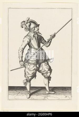 Soldier wearing his skewer with both hands at his right-hand side, pointing up the tip obliquely; Arms handhe van Roers Musquettes and the Splies. A soldier, for full, who wears a skewer (lance) with both hands at his right-hand side, pointing up the tip obliquely. This is the first operation for placing the skewer on the ground. This print is part of the range of 32 numbered prints of skewers from the arms. Stock Photo