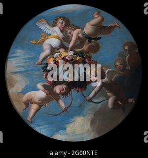 Putti With Flower Garland. Round ceiling piece with putti with a floral wreath, two putti have an arrow and bow. Stock Photo
