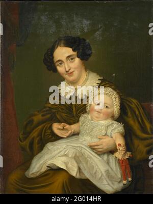 Mrs. Carp And Her Young Son. Portrait of Mrs. Carp and her son. Sitting with the child holding a doll on shot. Stock Photo
