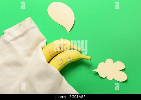 Creative composition with bananas on color background, closeup Stock Photo