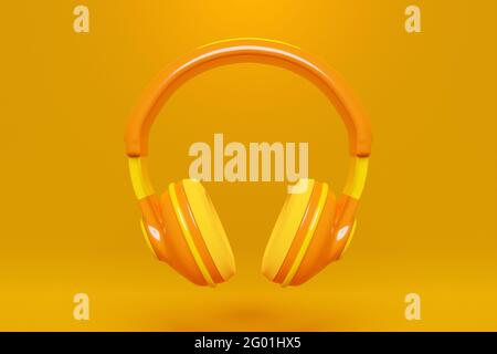 3d illustration of orange retro headphones  on  orange   isolated background on neon lights. Headphone icon illustration Stock Photo