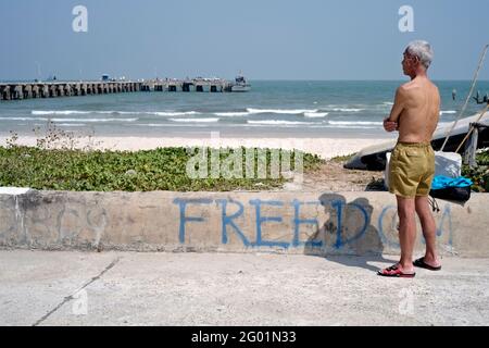 Freedom concept of the call of the  sea for a man looking over the ocean Stock Photo