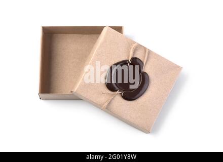 cardboard box with sealing wax seal open on a white background with clipping path Stock Photo