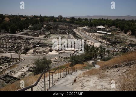 Roman and Byzantine ruins of Bet or Beit She'an or Scythopolis in the Jordan Valley as seen from the Tel of the ancient city ruined in a 749 AD quake. Stock Photo