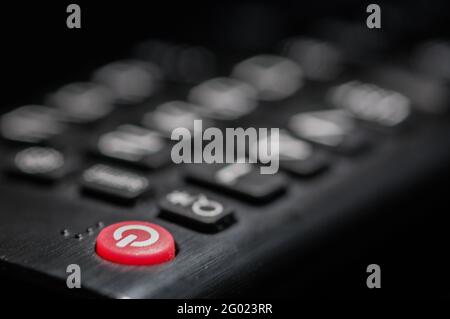 Close up red power button of TV remote control Stock Photo