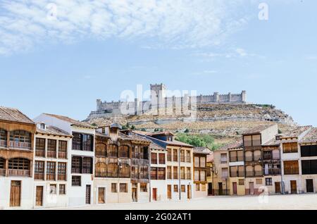 View of the castle of Peñafiel from the Plaza del Coso. Castilla y Leon Tourism Stock Photo