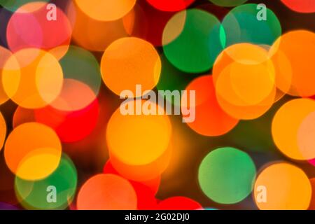 Geometric pattern background with christmas lights, round blurry circles useful as web design wallpaper Stock Photo