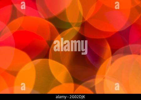Geometric pattern background with christmas lights, round blurry circles useful as web design wallpaper Stock Photo