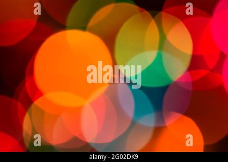Geometric pattern background with christmas lights, round blurry circles useful as web design wallpaper Stock Photo
