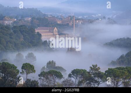 Autumn foggy sunrise in the textile colony (company town) of Cal Vidal (Berguedà, Catalonia, Spain) Stock Photo