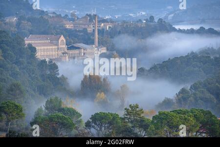 Autumn foggy sunrise in the textile colony (company town) of Cal Vidal (Berguedà, Catalonia, Spain) Stock Photo