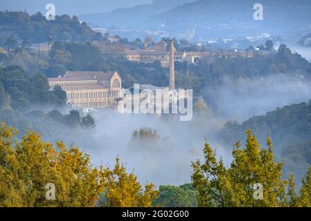 Autumn foggy sunrise in the textile colony (company town) of Cal Vidal (Berguedà, Catalonia, Spain) Stock Photo