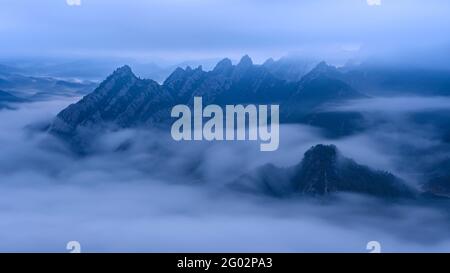 Serra de Bastets seen from the Lord Sanctuary in a foggy morning (Solsonès, Catalonia, Spain, Pyrenees) Stock Photo