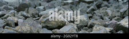 Large stones on the bank by the river Stock Photo