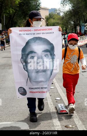 Mexico City, Mexico. 30th May, 2021. Relatives take part during a march at Reforma Avenue as part of the International Week of the Disappeared persons in Mexico, relatives protest against the inaction and indifference of the governments to solve their cases on May 30, 2021 in Mexico City, Mexico. (Photo by Eyepix/Sipa USA) Credit: Sipa USA/Alamy Live News Stock Photo