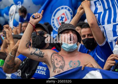 Mexico City, Mexico. 30th May, 2021. MEXICO CITY, MEXICO - MAY 30: Fans of Cruz Azul meet outside the Azteca Stadium to support their team, during the Final of the Closing Tournament of the Mexican Football League, between Cruz Azul and Santos Laguna on May 30, 2021 in Mexico City, Mexico. (Photo by Eyepix/Sipa USA) Credit: Sipa USA/Alamy Live News Stock Photo