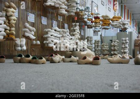 Holland, MI, USA. Traditional Dutch wooden shoes for sale at the De Klomp Wooden Shoe and Delft Factory. Stock Photo